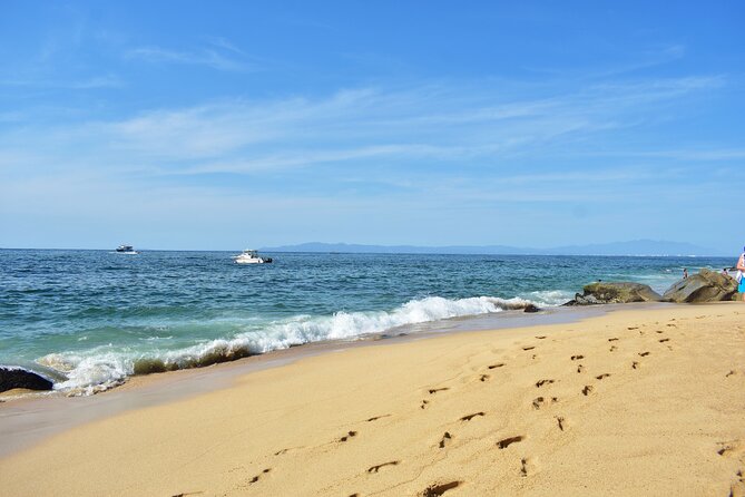 Catamaran Tour to the Arches, Playa las Animas, Snorkeling and more - Back on board at Puerto Mágico: open bar, games, music, sunset