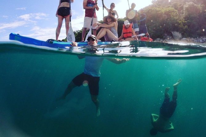 Los Arcos, Animas and Quimixto Snorkel Cruise in Puerto Vallarta All Inclusive - Las Animas beach time: kayaking, paddle boarding, and cash planning