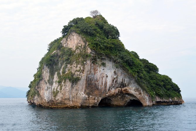 Los Arcos, Animas and Quimixto Snorkel Cruise in Puerto Vallarta All Inclusive - Boarding day vibes: catamaran travel, music, and the crowd factor
