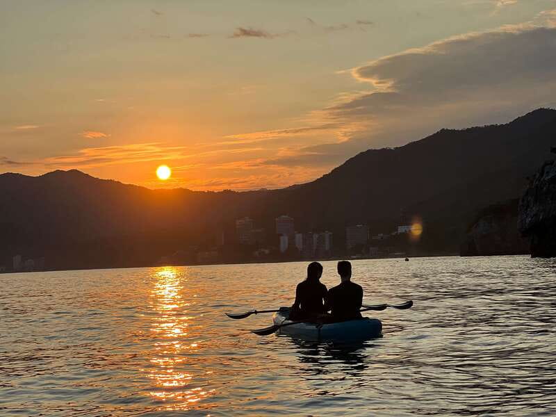 Mismaloya: Los Arcos Bioluminescent Waters Kayak & Cave Tour - The 3-hour flow: shuttle, lesson, paddle out, caves, and glowing water