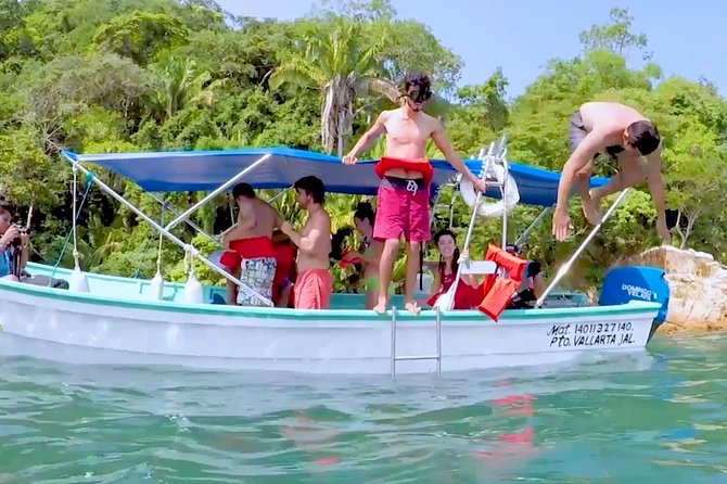 Private Boat Tour to Yelapa with Snorkeling and Waterfall Hike - Los Arcos National Marine Park: snorkeling in arches, tunnels, and reef