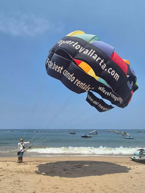 Puerto Vallarta: Private Parasailing Experience - Getting started at the beach: Dock of the Dead to Juanillos