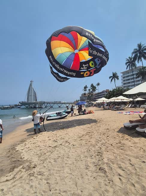 Puerto Vallarta: Private Parasailing Experience - Safety setup: harness, life jacket, and instruction