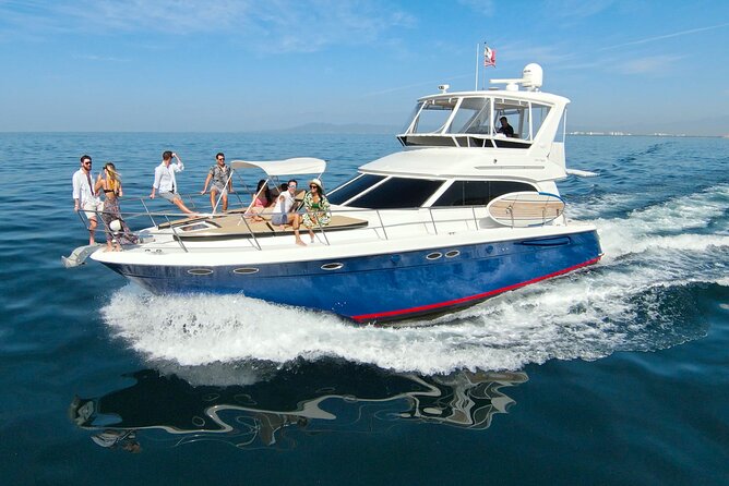 Puerto Vallarta: Private Swim & Snorkel Yacht Tour w/Open Bar - Malecon and the iconic church Corona: the scenic ride back