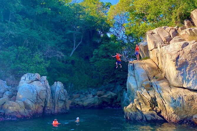 Snorkeling at Los Arcos 5 islands Hidden Beach and Cliff Jumping - A Boat-Only Hidden Beach for Swimming and Sunbathing