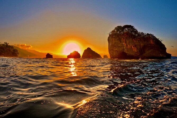 Sunset and Bioluminescence Boat Tour at Los Arcos Islands - Bioluminescence in dark caves: what to expect, and how to get the best glow